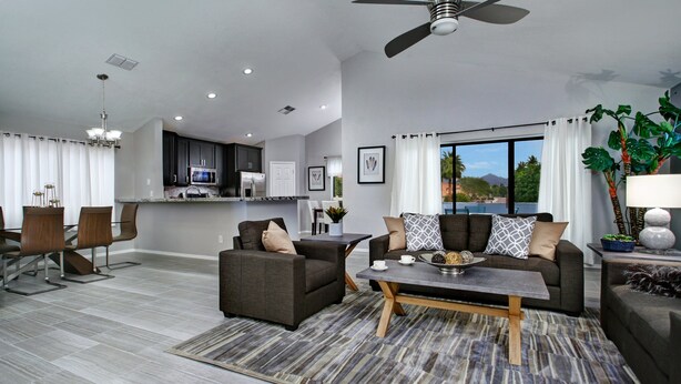 A modern living room with a sofa set, a coffee table, and a dining area with chairs. - 1st Part of Description has Discounts! Best part of Scottsdale! Pool & Hot Tub! (Scottsdale)