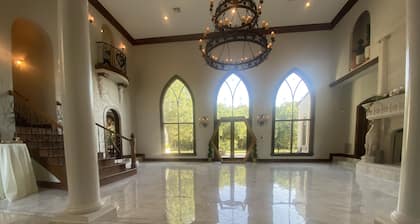 Elegant, romantic castle w/ rooftop deck, forest, pond and theater!