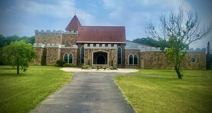 Elegant, romantic castle w/ rooftop deck, forest, pond and theater!