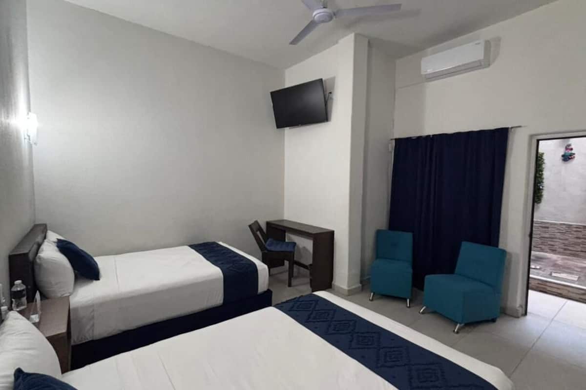 Chambre Standard, 2 lits doubles | Rideaux occultants, Wi-Fi gratuit, draps fournis