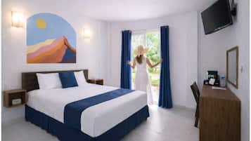 Habitación ejecutiva, vistas a la ciudad | Cortinas opacas, wifi gratis, ropa de cama