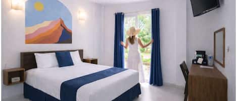 Habitación ejecutiva, vistas a la ciudad | Cortinas opacas, wifi gratis, ropa de cama