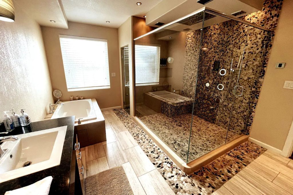 Bathtub, hair dryer, towels, soap