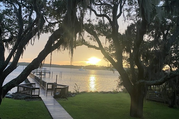 Beautiful view from screened porch at the ever changing sunset and water views