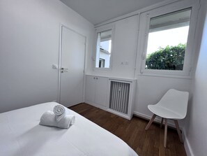 2 عدّة غرف نوم ومكواة/لوح كي وواي فاي مجانًا وملاءات أسرّة