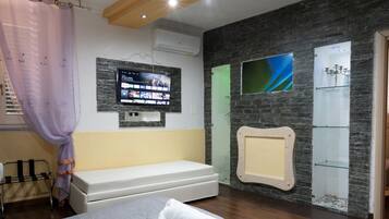 1 chambre, fer et planche Ă repasser, Wi-Fi gratuit, draps fournis