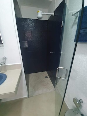 Shower, towels, soap, shampoo