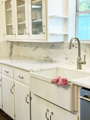 Bathtub, hair dryer, towels, soap