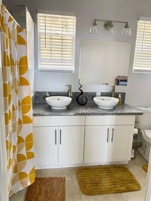 Shower, towels, toilet paper