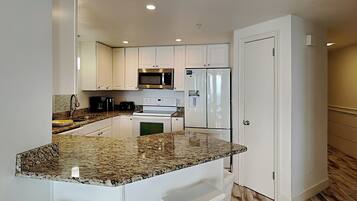 Condo, Multiple Beds, Balcony, Ocean View | Private kitchen | Fridge, microwave, oven, stovetop