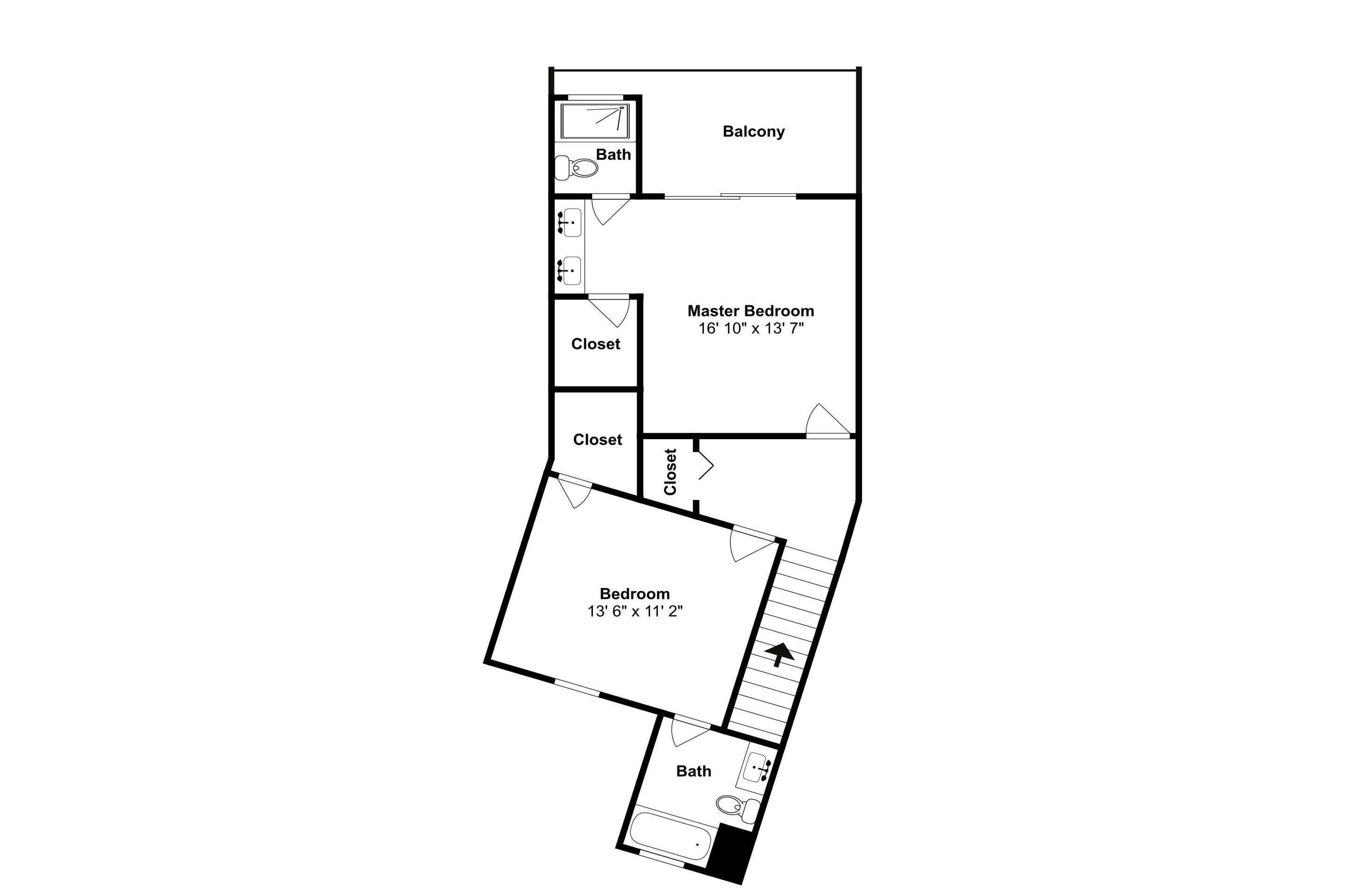 Grundriss einer Studio-Wohnung mit Schlafzimmer, zwei Abstellräumen, einem Balkon und zwei Bädern.