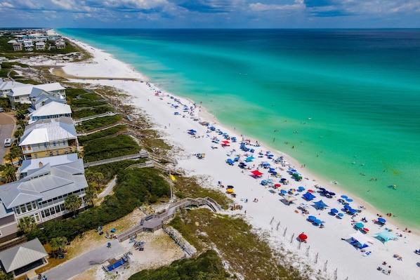 Enjoy stunning views of the beach from your balcony.