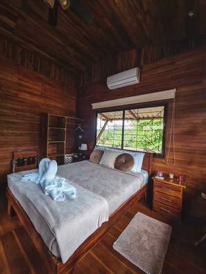 Design Cabin, 2 Bedrooms | 2 bedrooms, down comforters, free WiFi, bed sheets