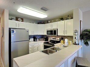 Condo, Multiple Beds, Balcony, Partial Sea View | Private kitchen | Fridge, microwave, oven, stovetop - The Dunes #208 (Gulf Shores)