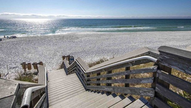 A wooden staircase leading to a beach with a clear view of the ocean. - Seagrove Highlands by Southern Vacation Rentals (Santa Rosa Beach)