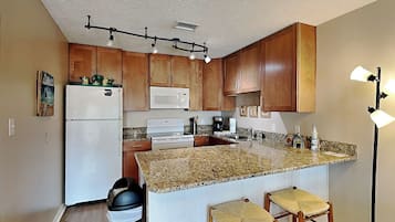 Condo, Multiple Beds, Balcony, Partial Sea View | Private kitchen | Fridge, microwave, oven, stovetop