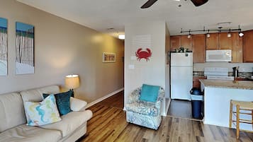 Condo, Multiple Beds, Balcony, Partial Sea View | Living area | TV