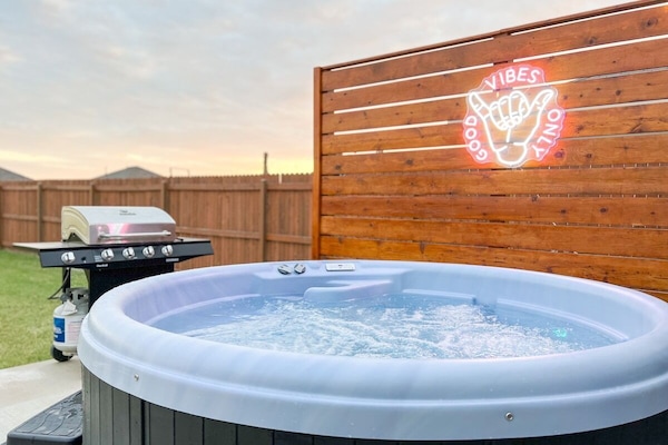 Classic spa that seats up to 6 adults. 
Stainless steel propane grill.