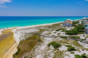 Guests can walk to the beach from this coastal property via a boardwalk.