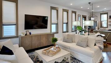 House, Multiple Beds, Balcony, Garden View | Living area | 40-inch TV with digital channels