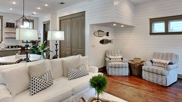 House, Multiple Beds, Balcony, Garden View | Living area | 40-inch TV with digital channels