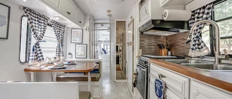 Fridge, microwave, stovetop, coffee/tea maker