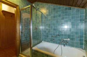 Bathtub, hair dryer, towels