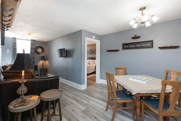Great view of how the living room and dining room come together with bedroom.