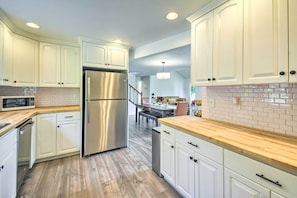 Enjoy cooking and dining in this well-equipped kitchen with a dining area.