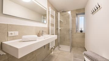Shower, free toiletries, hair dryer, towels