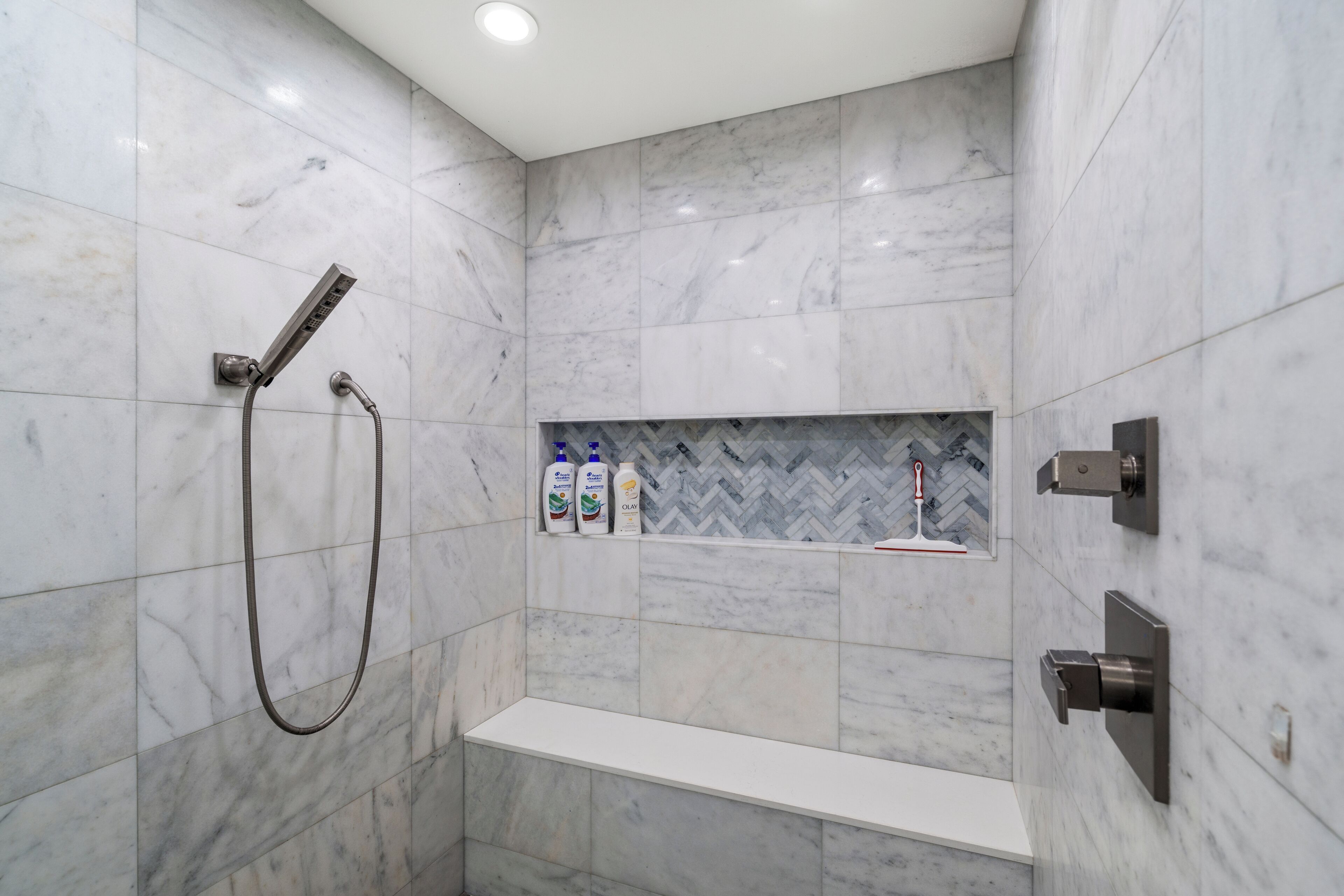 Combined shower/tub, hair dryer, towels, soap