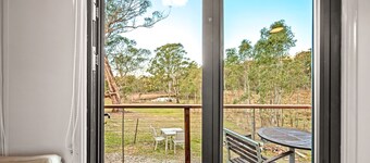 Unique two tiny homes set up with private dam