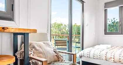 Unique two tiny homes set up with private dam
