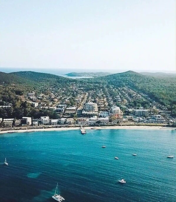Overlooking the marina, this coastal town offers stunning views of the sea and surrounding hills.