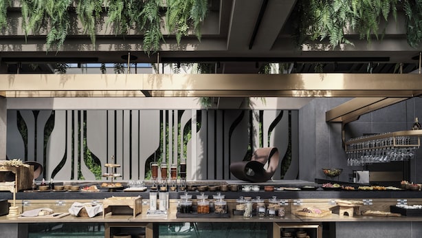 Un restaurante moderno con una zona de bar, asientos y una cocina visible al fondo.