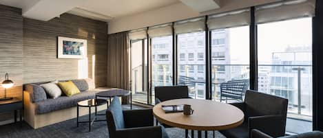 Deluxe King Room, Non Smoking | Living area | Flat-screen TV