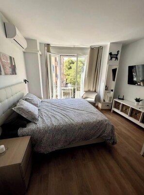 1 dormitorio, tabla de planchar con plancha, wifi gratis y ropa de cama