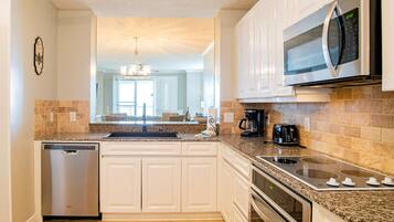 Condo, Multiple Beds, Balcony, Ocean View (#2C - No Pets) | Private kitchen | Fridge, microwave, oven, stovetop