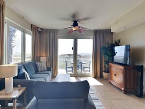 Condo (#101A - No Pets) | Living area | TV - Beach Club by Southern Vacation Rentals (Pensacola Beach)
