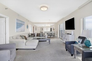 Condo, Multiple Beds, Balcony, Ocean View (#1610 - No Pets) | Living area | Flat-screen TV - Emerald Dolphin by Southern Vacation Rentals (Pensacola Beach)
