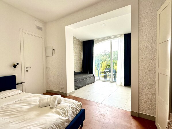 Suite Deluxe | 1 chambre, rideaux d’obscurcissement, système d’insonorisation