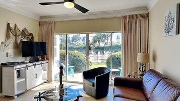 Condo, Multiple Beds, Kitchen, Garden View (#104 - No Pets) | Living area | TV