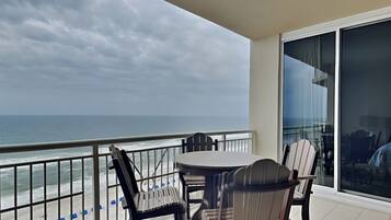 Condo, Multiple Beds, Balcony, Ocean View (#1203 East - No Pets) | Outdoor dining