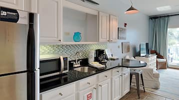Condo, 1 Queen Bed, Pool View (#206 - No Pets) | Private kitchen | Fridge, microwave, coffee/tea maker, cookware/dishes/utensils