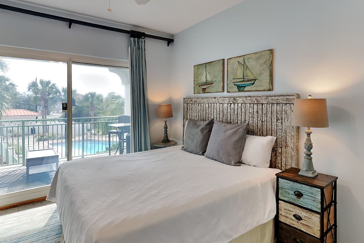 Condo, 1 Queen Bed, Pool View (#206 - No Pets) | 1 bedroom, WiFi (free), individually decorated, individually furnished