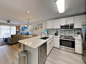 Condo, Multiple Beds, Balcony, Garden View (#1107 - No Pets Allowed) | Private kitchen | Fridge, microwave, oven, stovetop