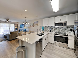 Condo, Multiple Beds, Balcony, Garden View (#1107 - No Pets Allowed) | Private kitchen | Fridge, microwave, oven, stovetop