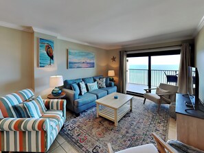 Condo, Multiple Beds, Balcony, Ocean View (#703 - No Pets) | Living area | TV - Ocean Breeze East by Southern Vacation Rentals (Pensacola)