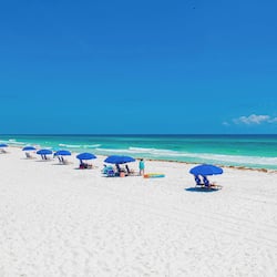 On the beach, sun loungers, beach umbrellas