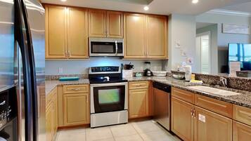 Condo, Multiple Beds, Balcony (#503D - No Pets) | Private kitchen | Stovetop, coffee/tea maker